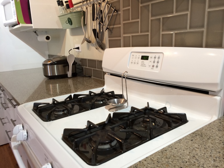 View of my counter, stove and microwave in my celiac safe gluten-free kitchen. 
